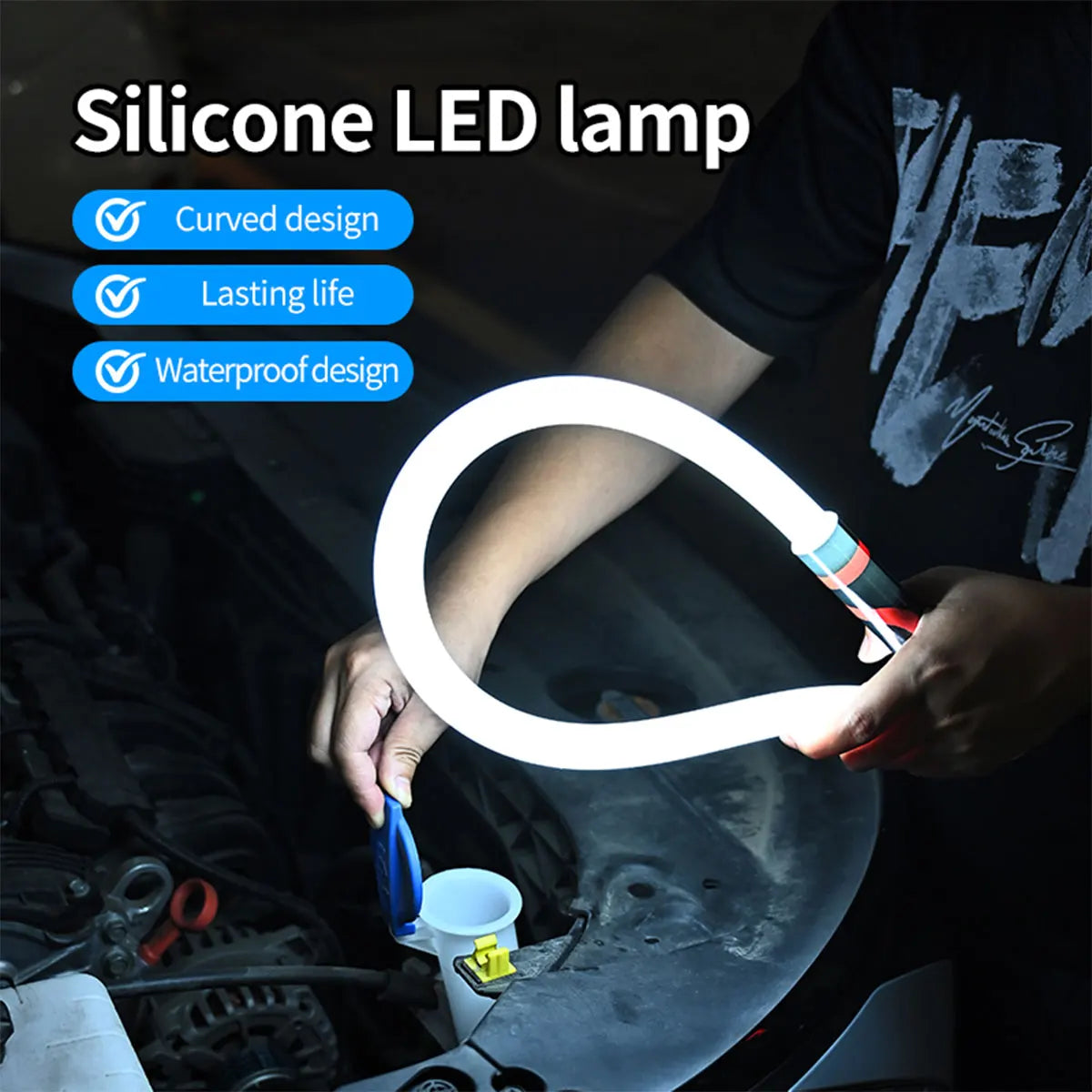A hand is holding a white silicone LED lamp with a curved design in a dark, automotive context.