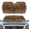 Leopard print car windshield sunshade placed on a silver car hood.