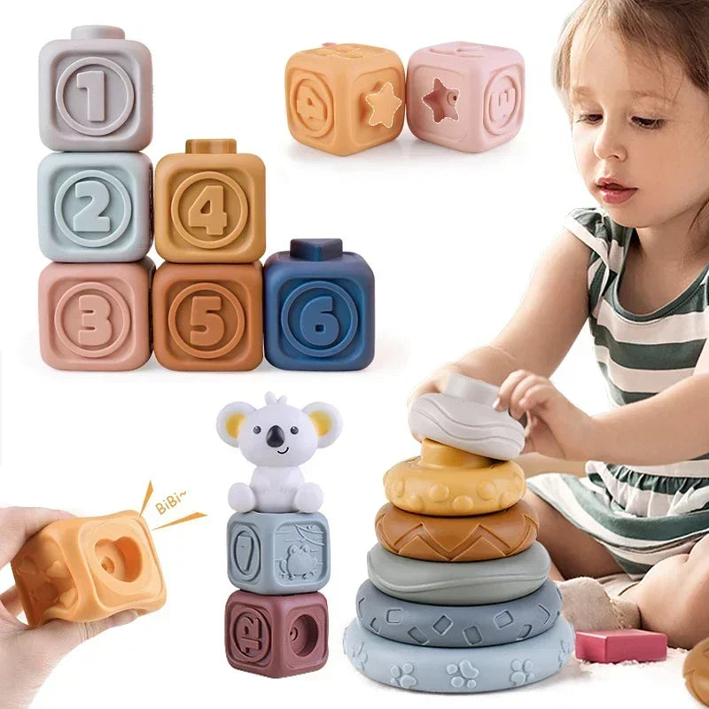 A collection of soft silicone building blocks in various colors and shapes for baby teething and early learning.
