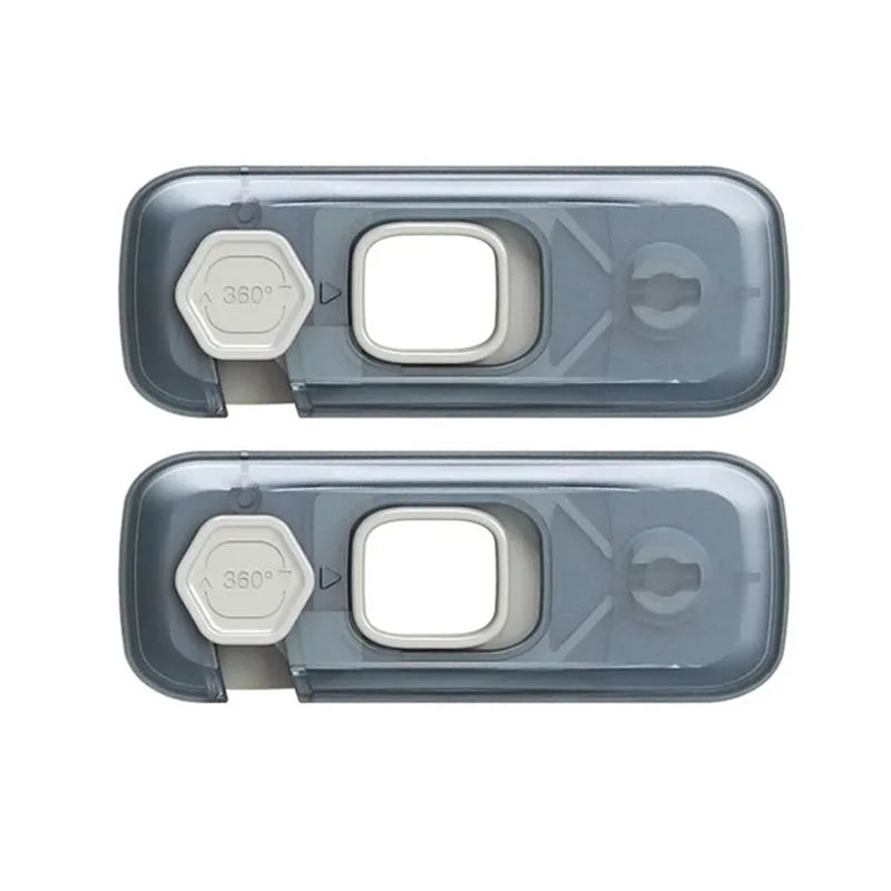 A clear plastic child safety cabinet lock with a white release mechanism.