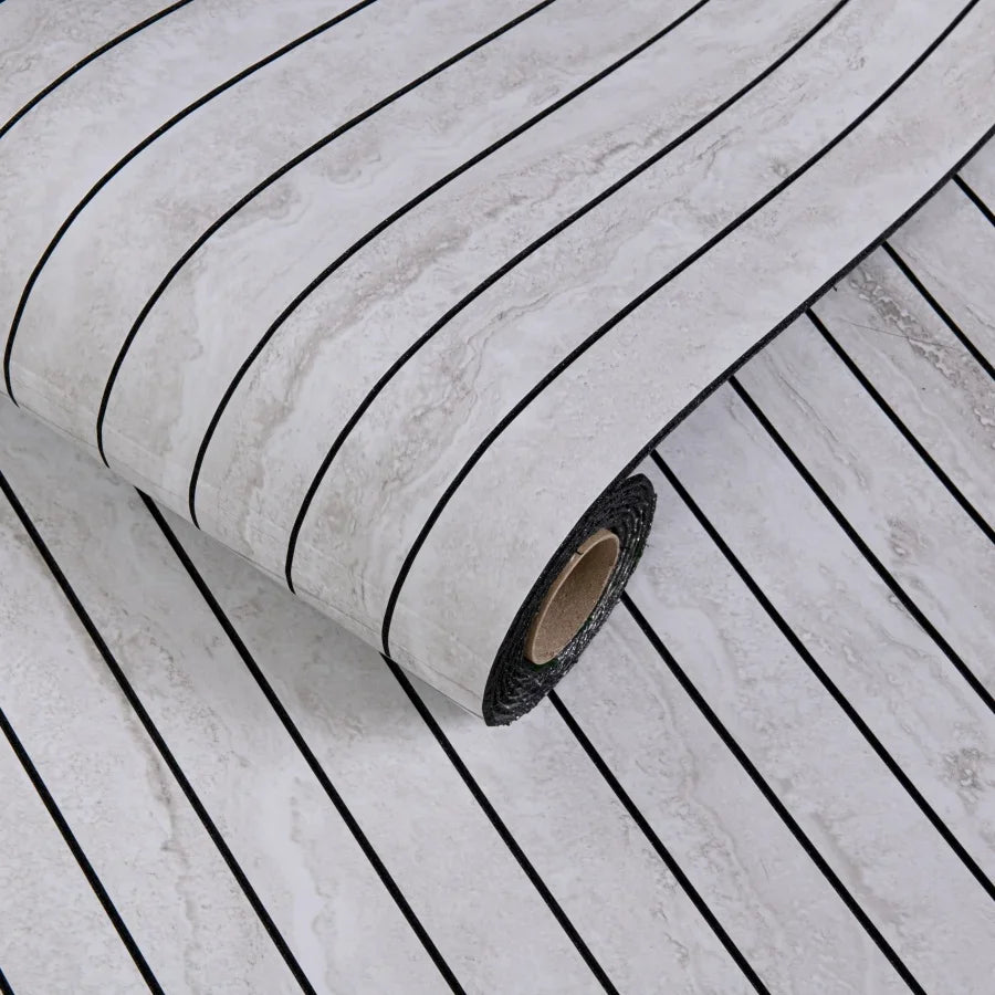 Roll of 3D grille pattern peel-and-stick wallpaper showing vertical stripes on a light gray background