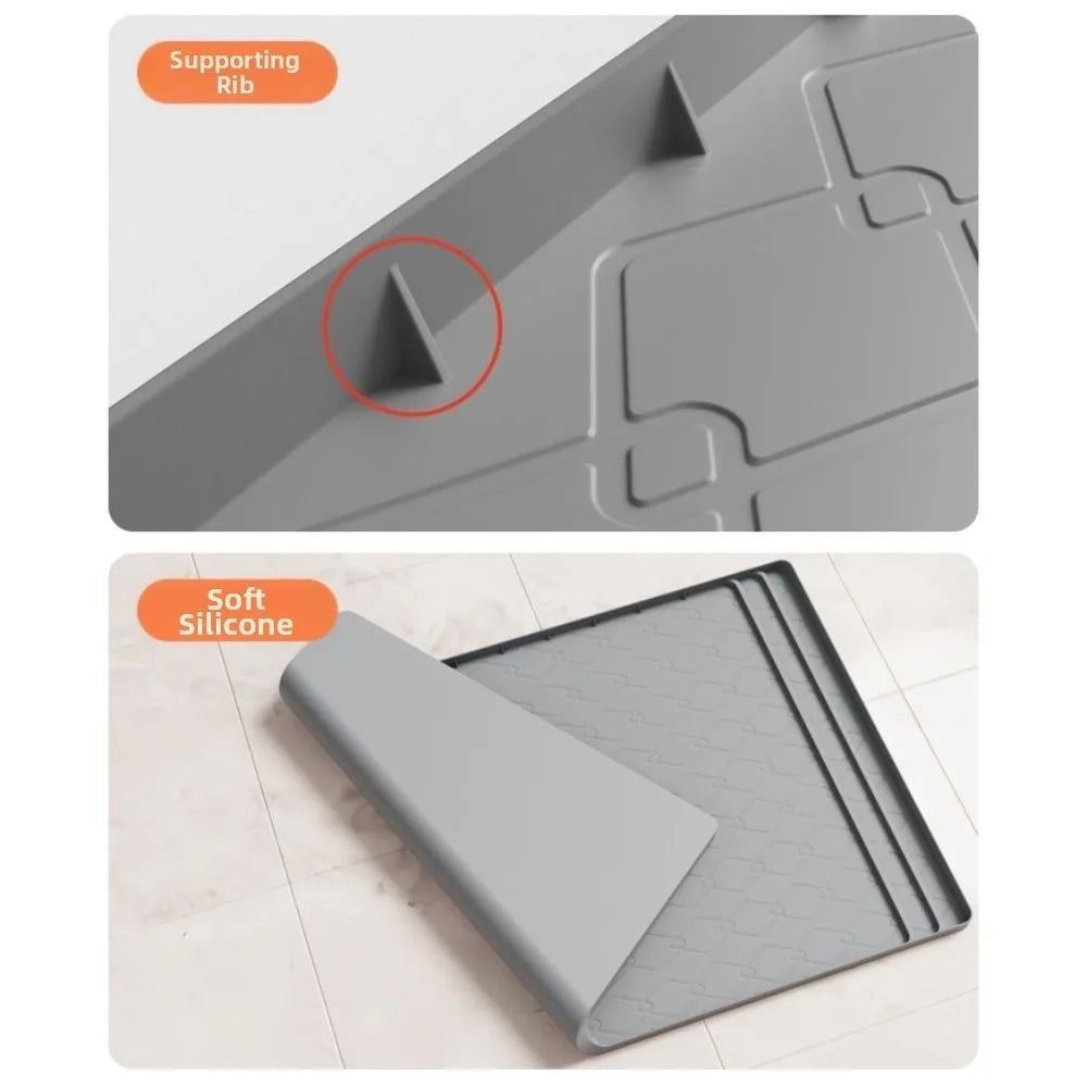 A close-up view of a silicone mat designed to protect under sink cabinets, showing its texture and shape.