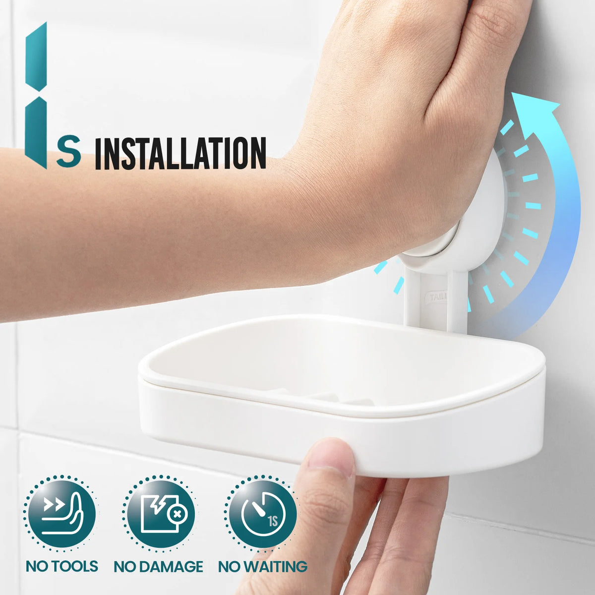A hand installs a white suction cup soap dish holder with a removable tray onto a white wall.