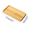 A wooden serving tray with dimensions 17.5cm x 8.8cm.