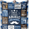 A personalized printed fleece throw blanket featuring text celebrating a grandfather and family