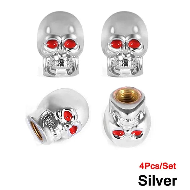 Set of four silver skull design tire valve stem caps