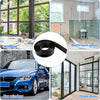 A collection of window, bathroom glass, and glass door cleaning tools including a car window and a shower glass.