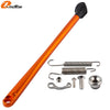 Orange KTM side stand kit with ABS foot and spring components