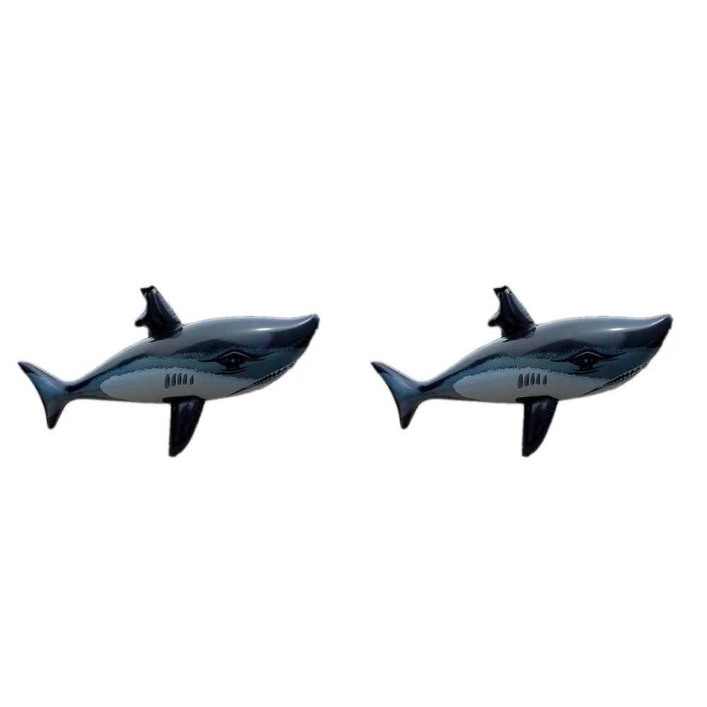 A gray and black inflatable shark pool float.