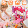 A set of mini reborn baby dolls with outfits and accessories are displayed on a soft blanket.