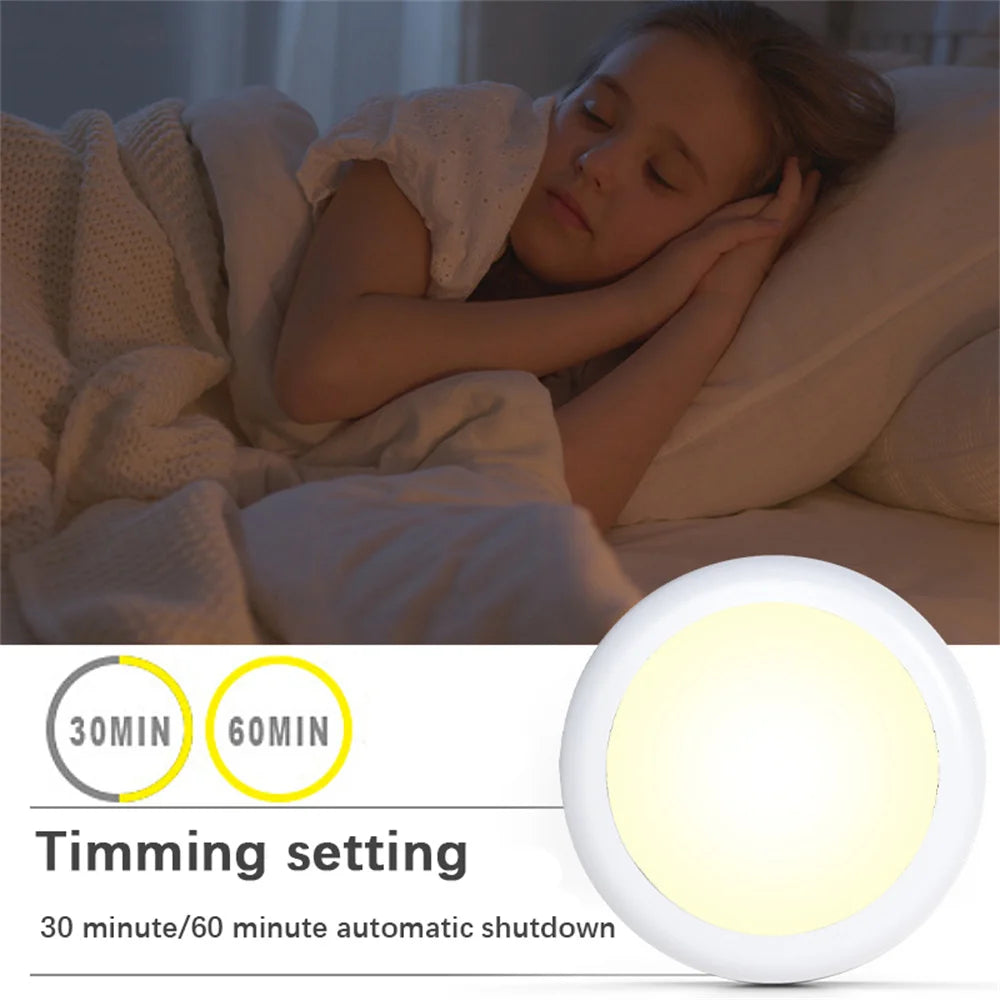 A white LED light fixture is shown next to a girl sleeping in bed, illustrating the 30 minute/60 minute timing setting.