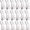 A set of white cascading clothes hanger connector hooks used for space-saving wardrobe organization.
