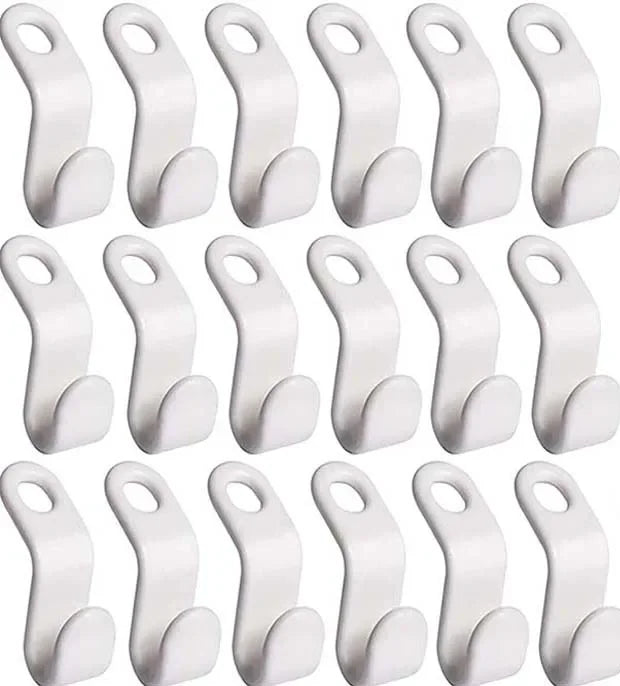 A set of white cascading clothes hanger connector hooks used for space-saving wardrobe organization.