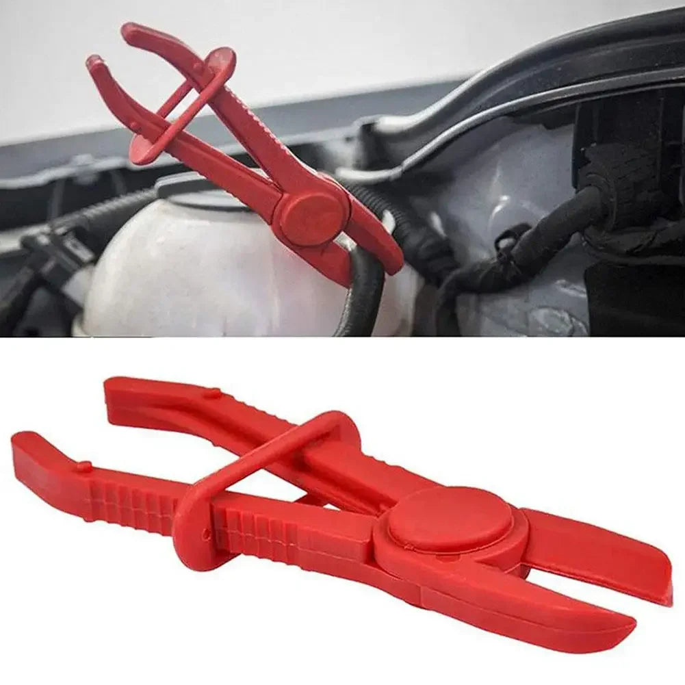 A set of three red hose clamp pliers used for car repair.