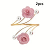 Two pink rose pattern curtain tiebacks with pearl accents and gold metal ties
