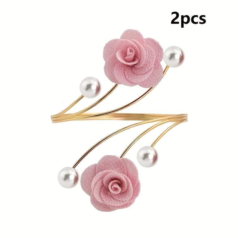 Two pink rose pattern curtain tiebacks with pearl accents and gold metal ties