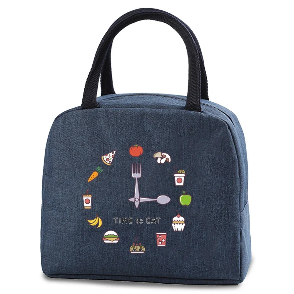 Dark blue insulated lunch bag with a handle featuring various food icons like a fork, sandwich, and apple.