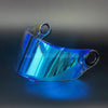 A clear blue replacement motorcycle helmet visor displayed on a dark surface.