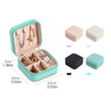 A teal PU leather jewelry storage box with a lid, showing various jewelry pieces and color options.