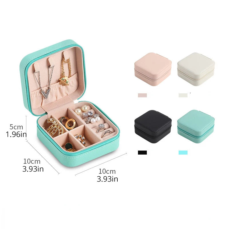 A teal PU leather jewelry storage box with a lid, showing various jewelry pieces and color options.