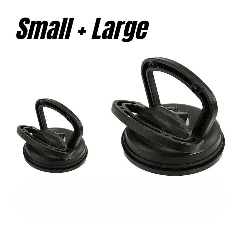 A set of small and large heavy-duty suction cup dent pullers for car body repair.