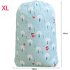 Light blue drawstring laundry bag featuring a pattern of white and red trees.