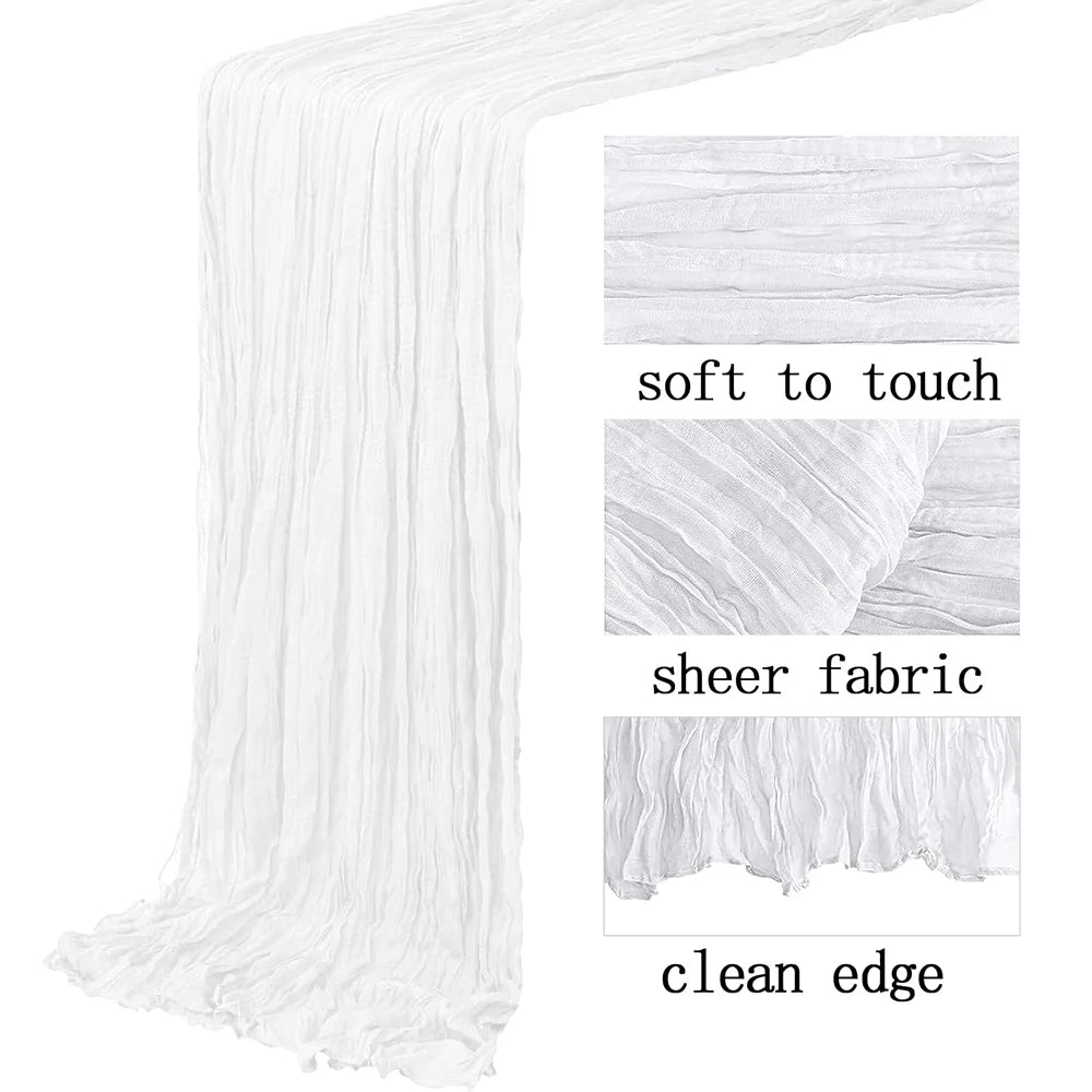 A white semi-sheer gauze table runner with a clean edge shown in detail.