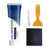 A tube of Wall Repair Paste kit with various tools for repairing wall damage, including a spatula and a black block.