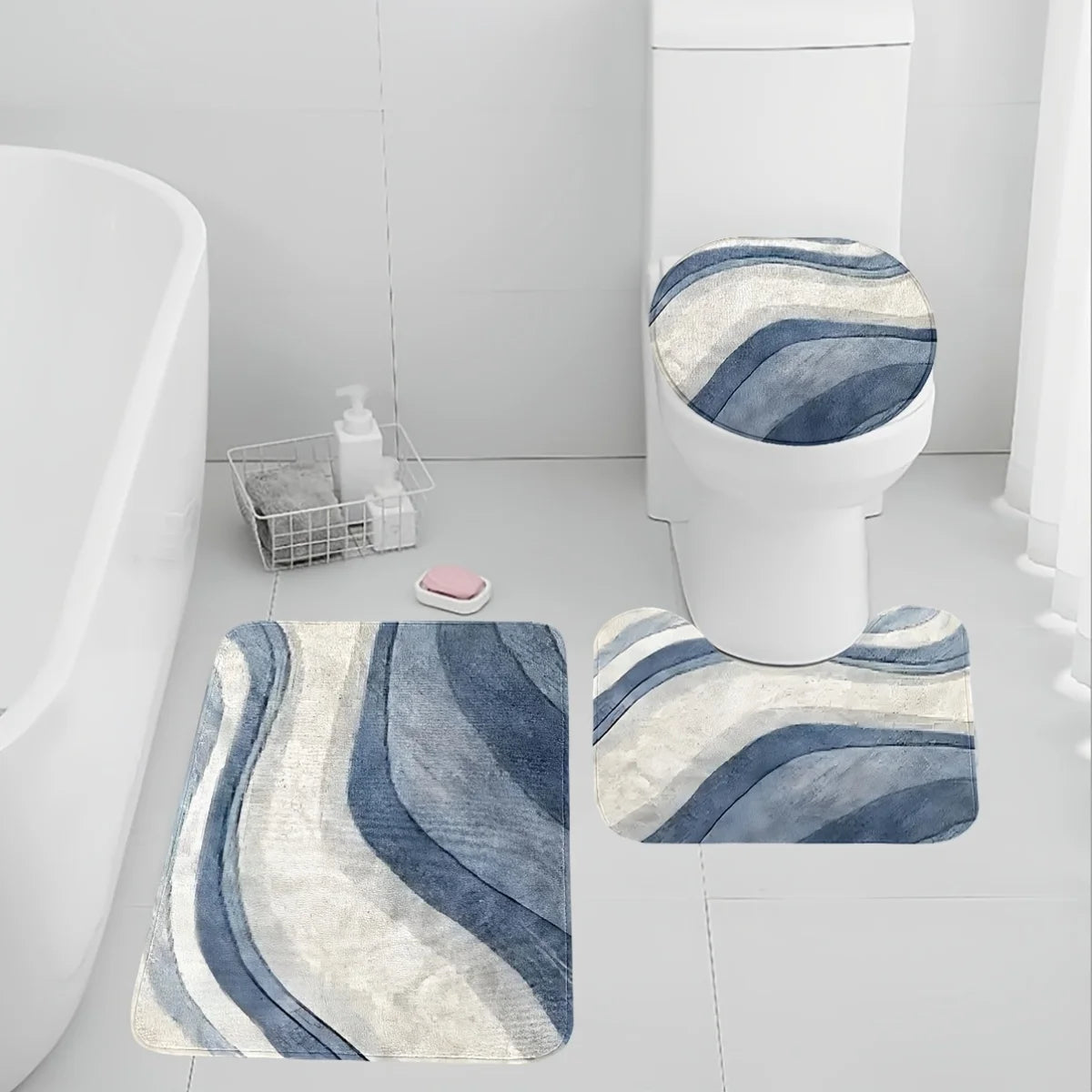 A set of three blue and white striped bathroom rugs, including a U-shaped toilet mat and cover.