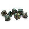 A set of ten dragon-embellished polyhedral dice in dark green and gold colors.