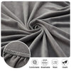 Close-up of a gray plush velvet stretch sofa seat cover fabric showing texture and features like comfort, breathability, and 