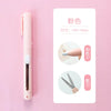A pink folding pen-shaped safety scissors with dimensions and usage instructions shown on a white background.