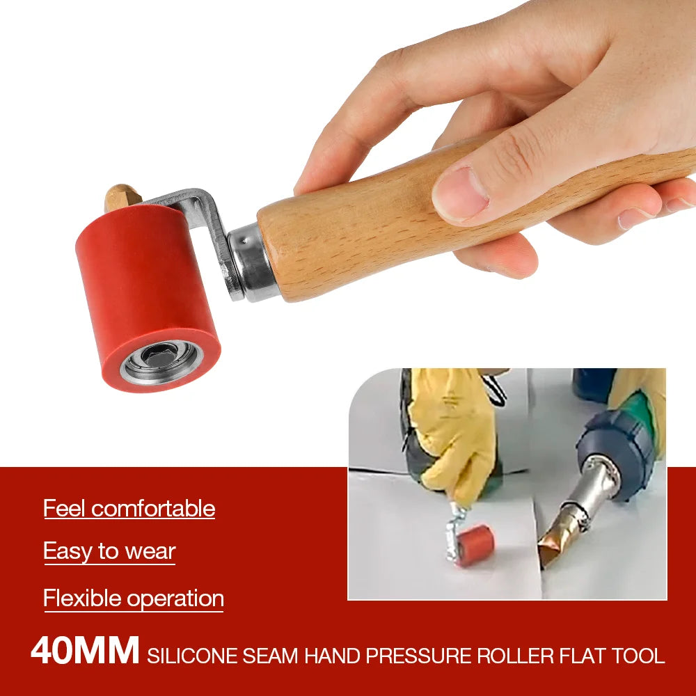 A hand is holding a 40mm silicone seam hand pressure roller flat tool for welding and waterproofing.