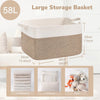 Large beige woven storage basket with measurements and examples of items it can hold.