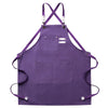 Purple cotton canvas apron with cross-back straps and multiple pockets