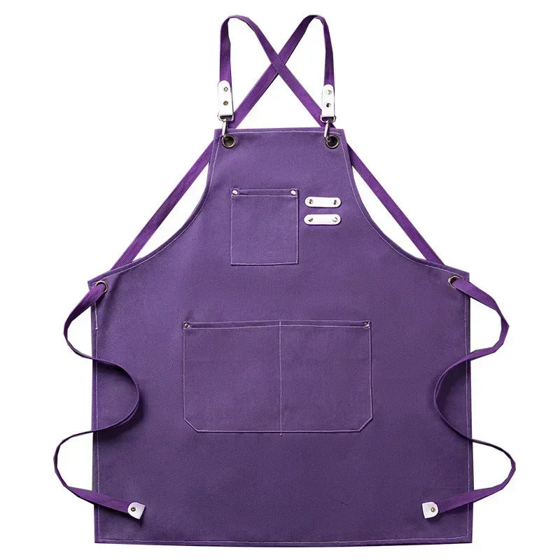 Purple cotton canvas apron with cross-back straps and multiple pockets