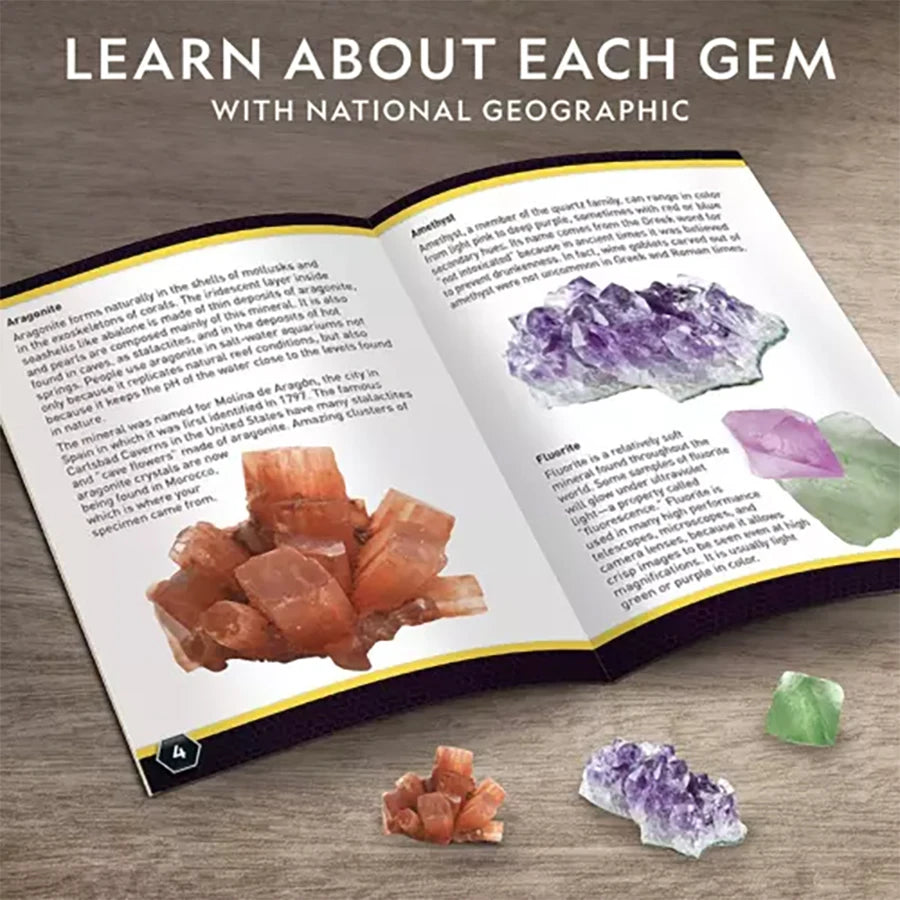 A page from a book about gemstones shows an amethyst crystal and a piece of raw pink quartz.
