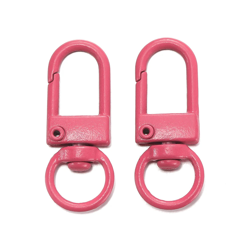 A pair of pink alloy lobster clasp hooks for DIY jewelry making