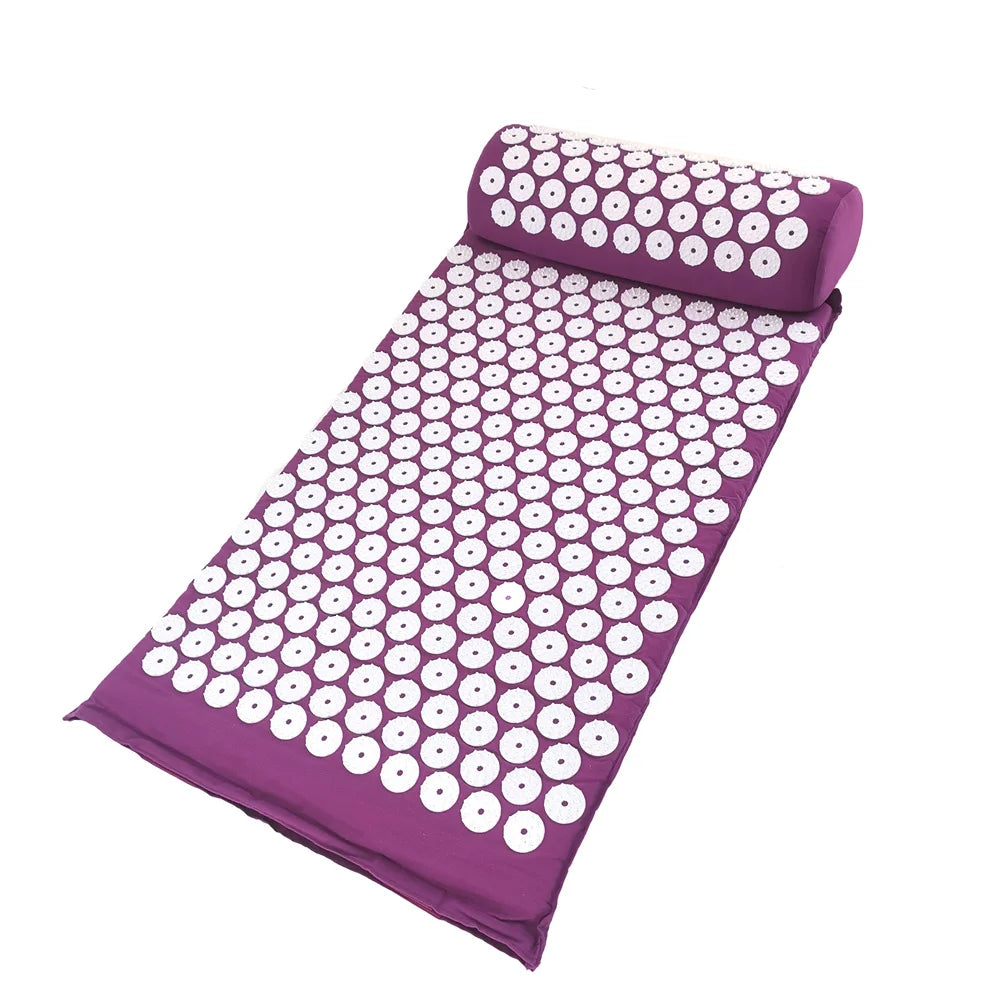 Purple acupressure mat and pillow set with white dots for pain relief and relaxation