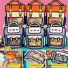 A display of cute cartoon backpack goodie bags for kids party favors in various colors and designs.