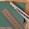 A pair of silver pinking shears is shown next to a ruler marked in centimeters, demonstrating the 10mm wave setting.