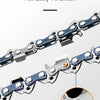 Close-up view of a resilient replacement chainsaw chain with metal links and a small orange component.