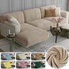 A collection of soft velvet elastic sofa covers in various neutral and pastel colors displayed on furniture.