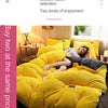 A bright yellow double-sided duvet cover set shown on a bed, highlighting the two kinds of enjoyment.
