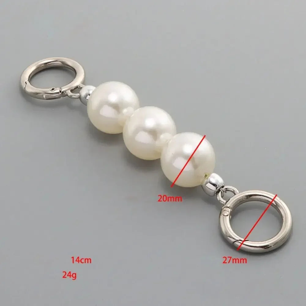 Silver pearl strap replacement featuring a loop and five round pearls.