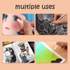 A set of white ink gel pens is shown being used for drawing and highlighting on various surfaces.