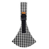 Black and white patterned ergonomic baby sling carrier with a black strap and padded hip seat
