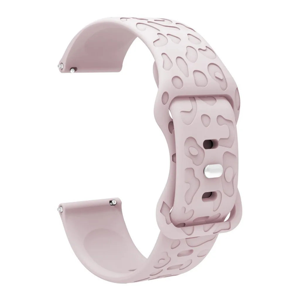 A light pink silicone watch band with a textured pattern shown from the side.