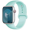 A light mint green silicone sport band for an Apple Watch displayed on a white background.