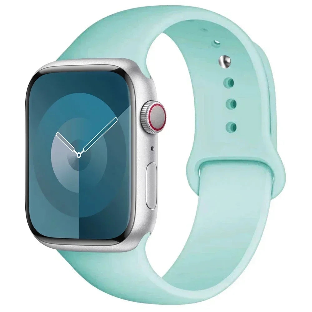 A light mint green silicone sport band for an Apple Watch displayed on a white background.
